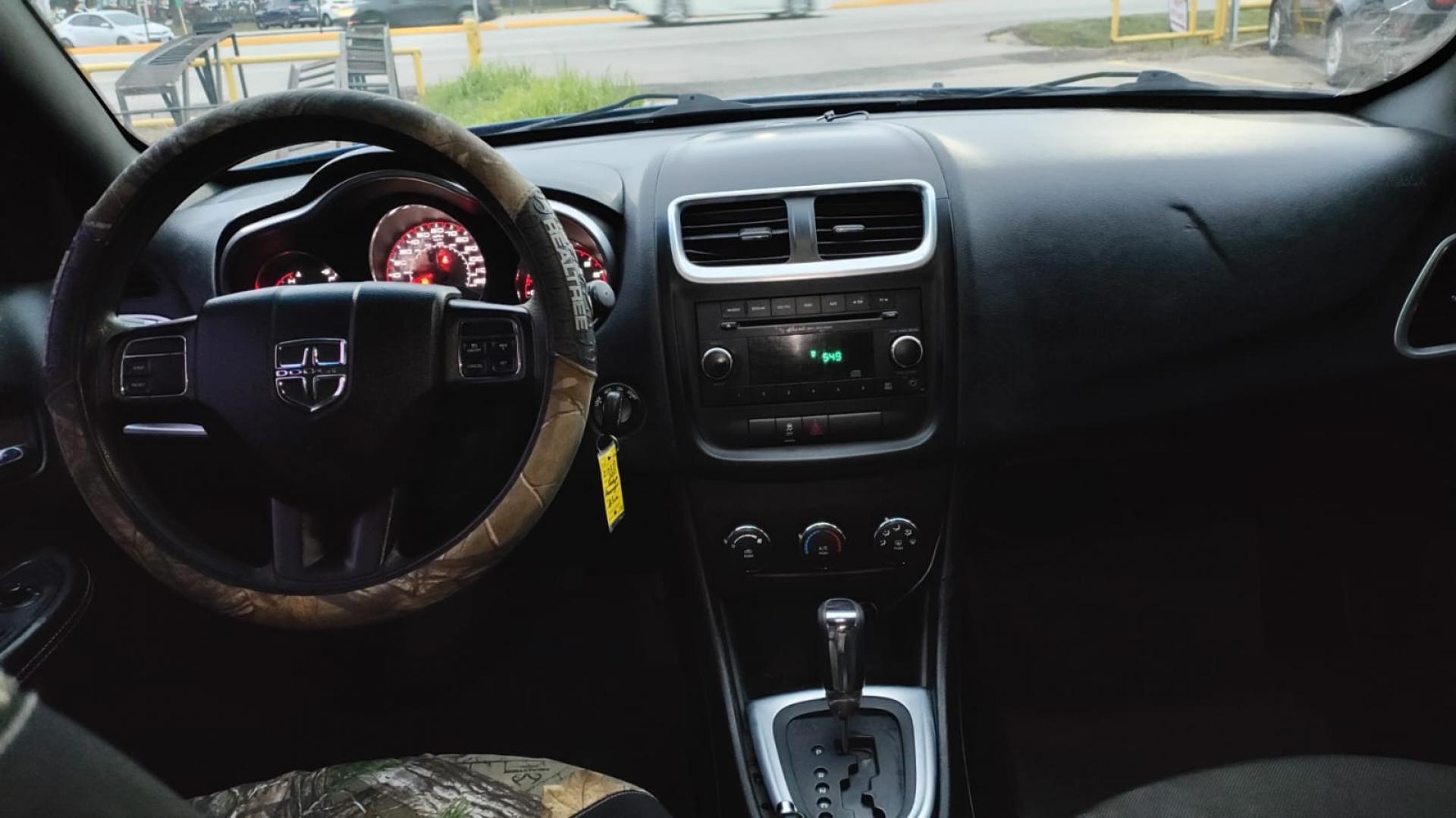 2014 Dodge Avenger SE (1C3CDZAB6EN) with an 2.4L L4 DOHC 16V engine, 4-Speed Automatic transmission, located at 16710 Clay Rd., Houston, TX, 77084, (281) 859-7900, 29.834864, -95.656166 - Photo#1